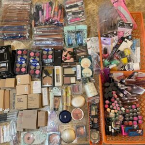Assorted cosmetic pallets featuring makeup, skincare, and beauty accessories
